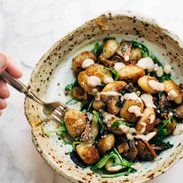 A picture of Mushroom Gnocchi with Arugula and Walnut Pesto