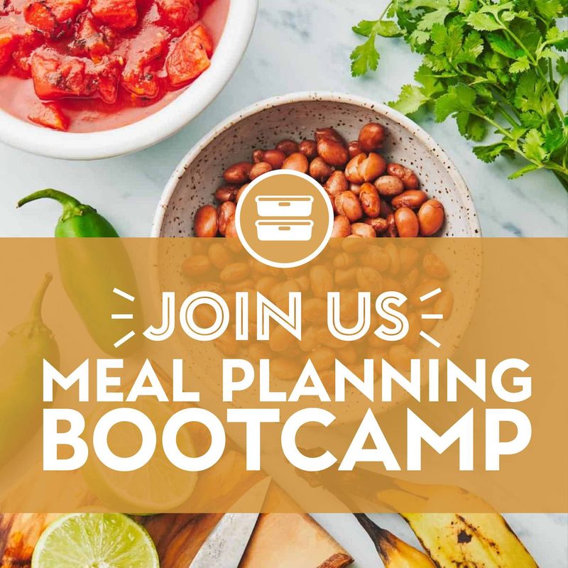 Meal prep happening on a counter with a cutting board and fresh ingredients.