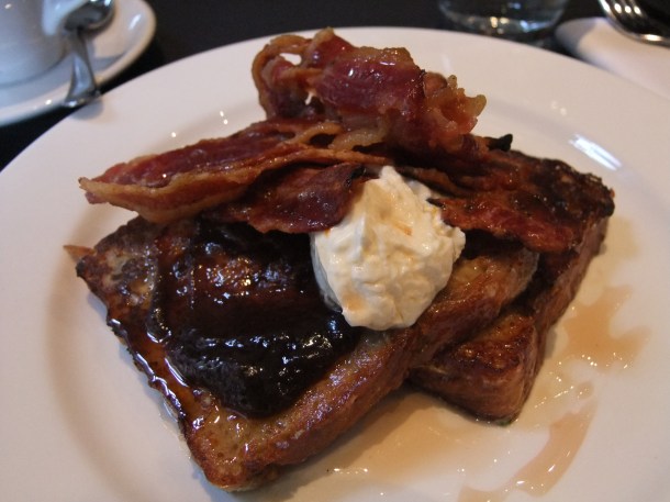 Spiced banana French toast with orange blossom labne, tamarind raisin relish, grilled streaky bacon & orange vanilla syrup at Kopapa