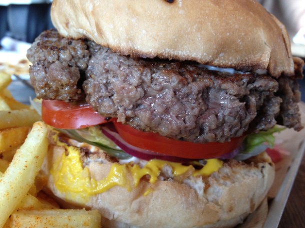 close up of burger at Duke's Brew and Que close up of burger at duke's brew and que