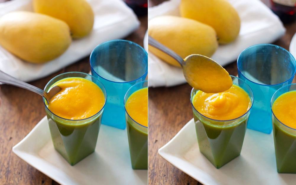 Papaya mango smoothies in blue cups.