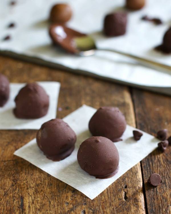 Peanut butter cookie dough balls covered in chocolate.