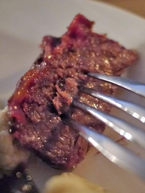 slice of short rib bourguignon at smokehouse