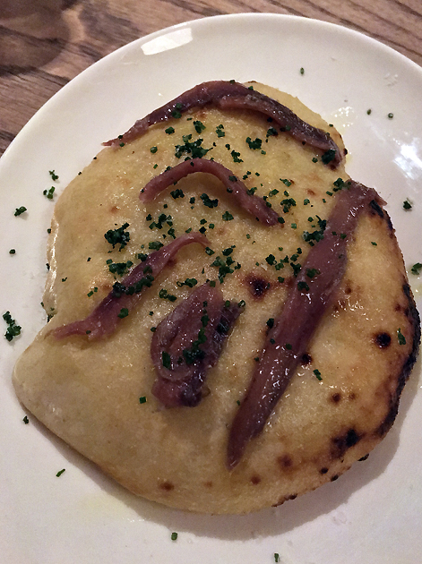 anchovies on bread at brat