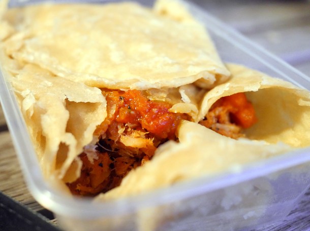 illustrative photo of the salt cod in roti from Kaieteur Kitchen