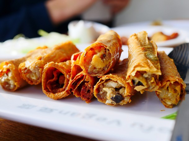 illustrative photo of the crispy stuffed tofu skin with house special sauce at Tofu Vegan