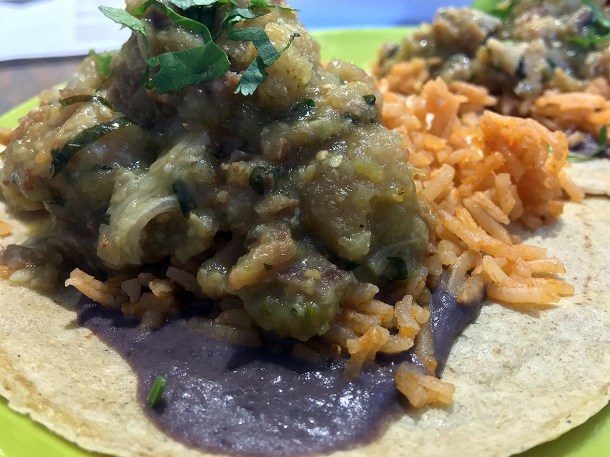 illustrative photo of the pork and rice tacos special at La Chingada