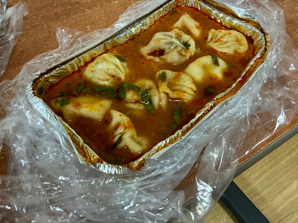 illustrative photo of the jhol momos from 7Spices at Grande International Hospital