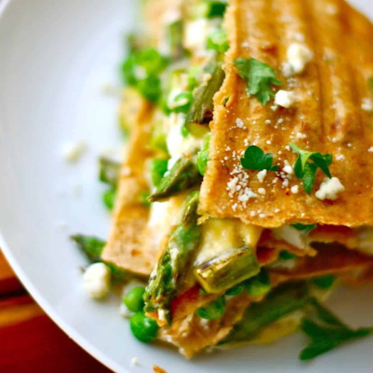 Asparagus quesadilla lasagna stuffed with cheese.