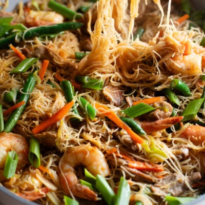 Pancit in a skillet.