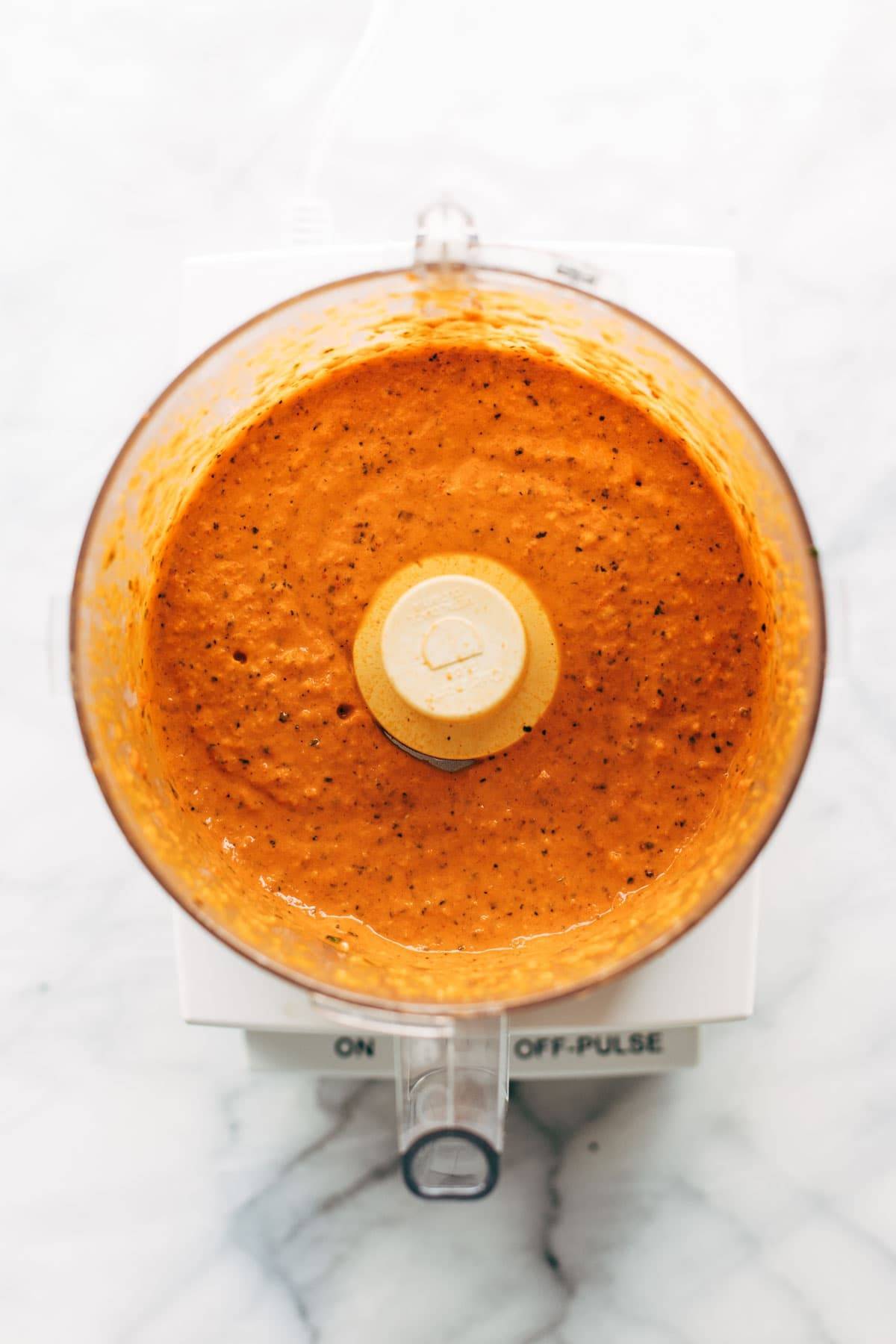 Red pepper sauce blended in a food processor.